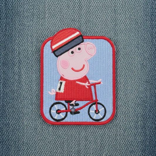 Strykelapp Peppa Gris på sykkel