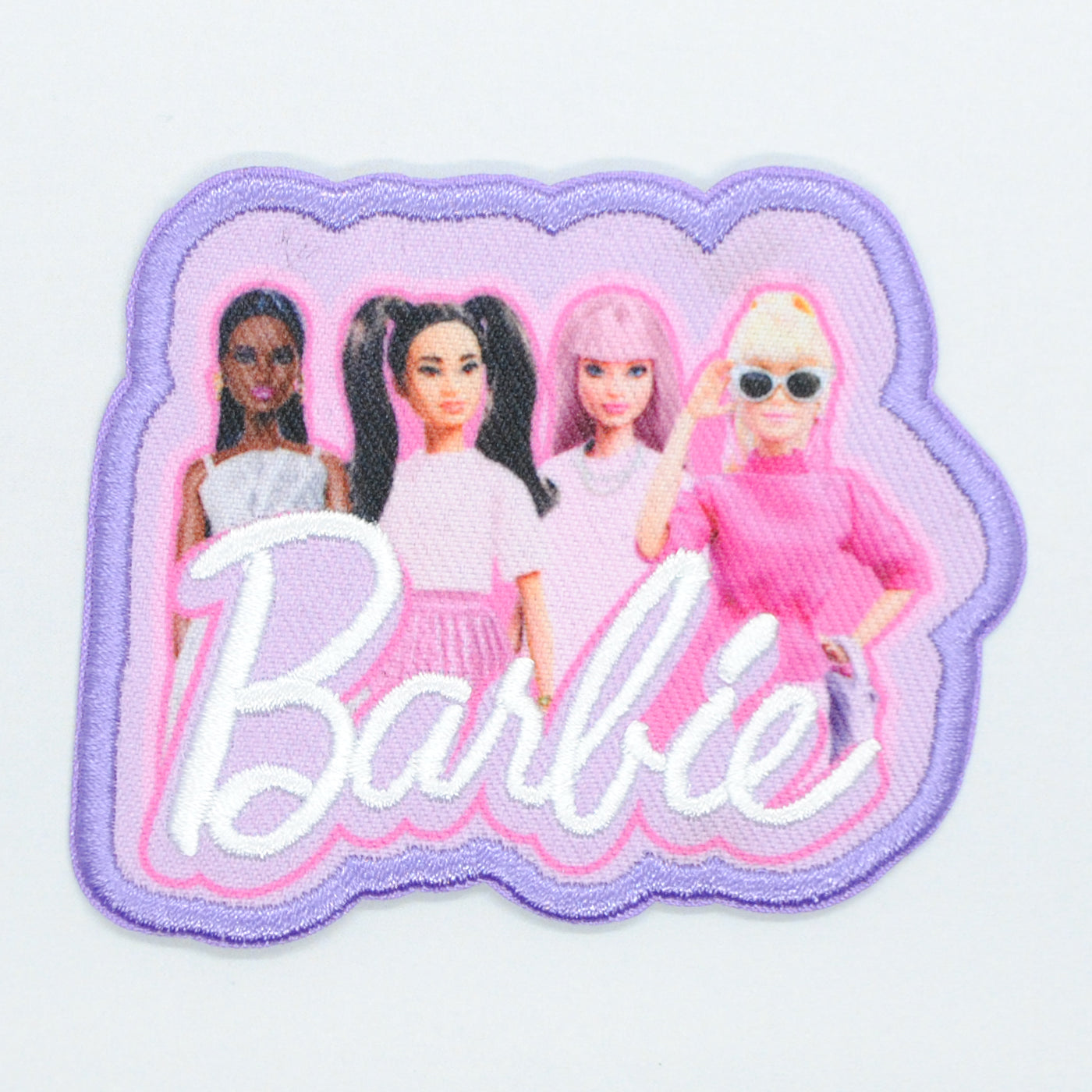 Brodert strykemerke av Barbie med venner