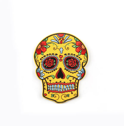 Brodert strykemerke av fargerik hodeskalle