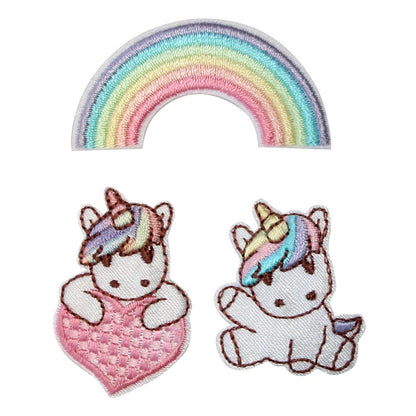 Brodert strykemerke av enhjørninger og regnbue