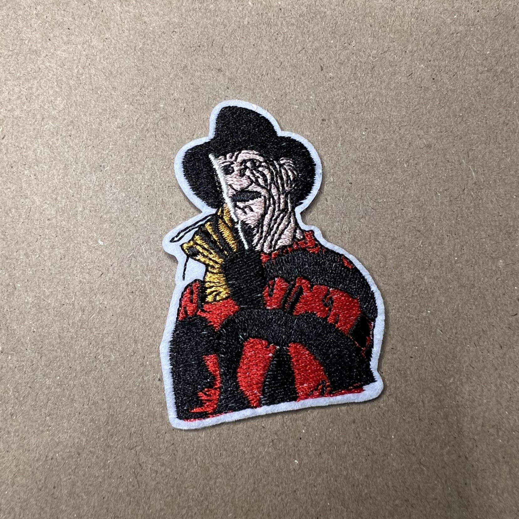 Brodert strykemerke av Freddy