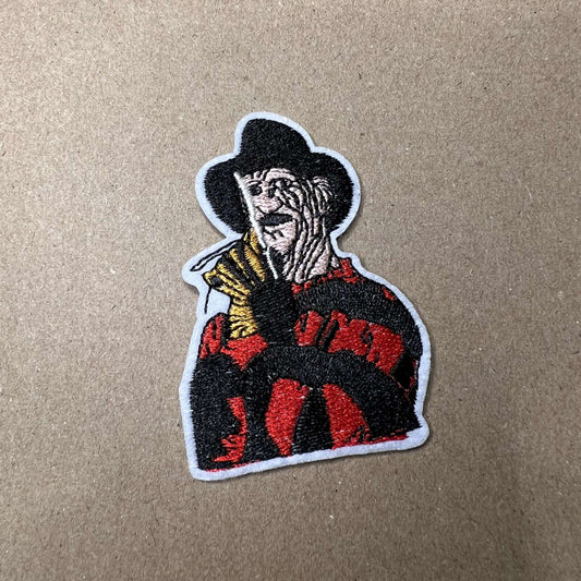 Brodert strykemerke av Freddy