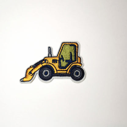 Brodert strykemerke av Gul Traktor