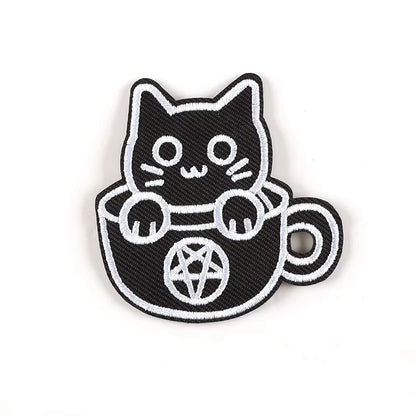 Brodert strykemerke av katt i kopp