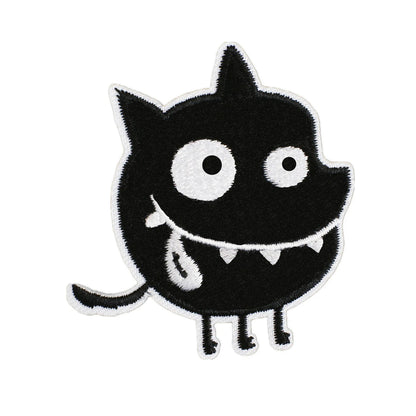 Brodert strykemerke av sort monster