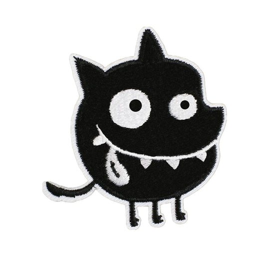 Brodert strykemerke av sort monster