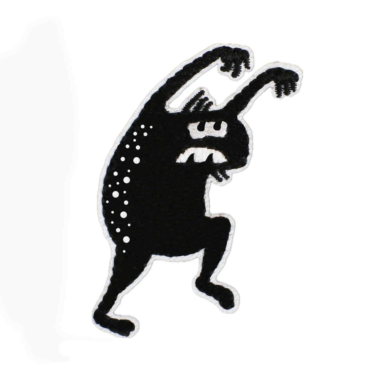 Brodert strykemerke av sort monster