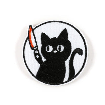 Brodert strykemerke av katt med kniv