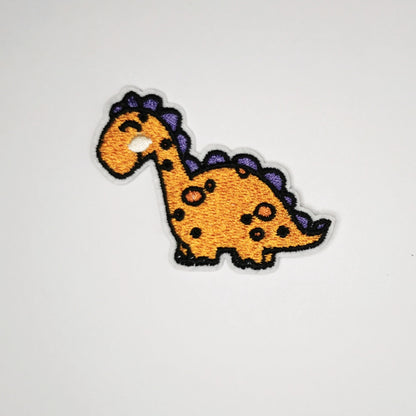 Strykelapp med motiv av Orange Dino