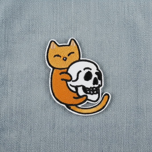 Orange katt strykelapp