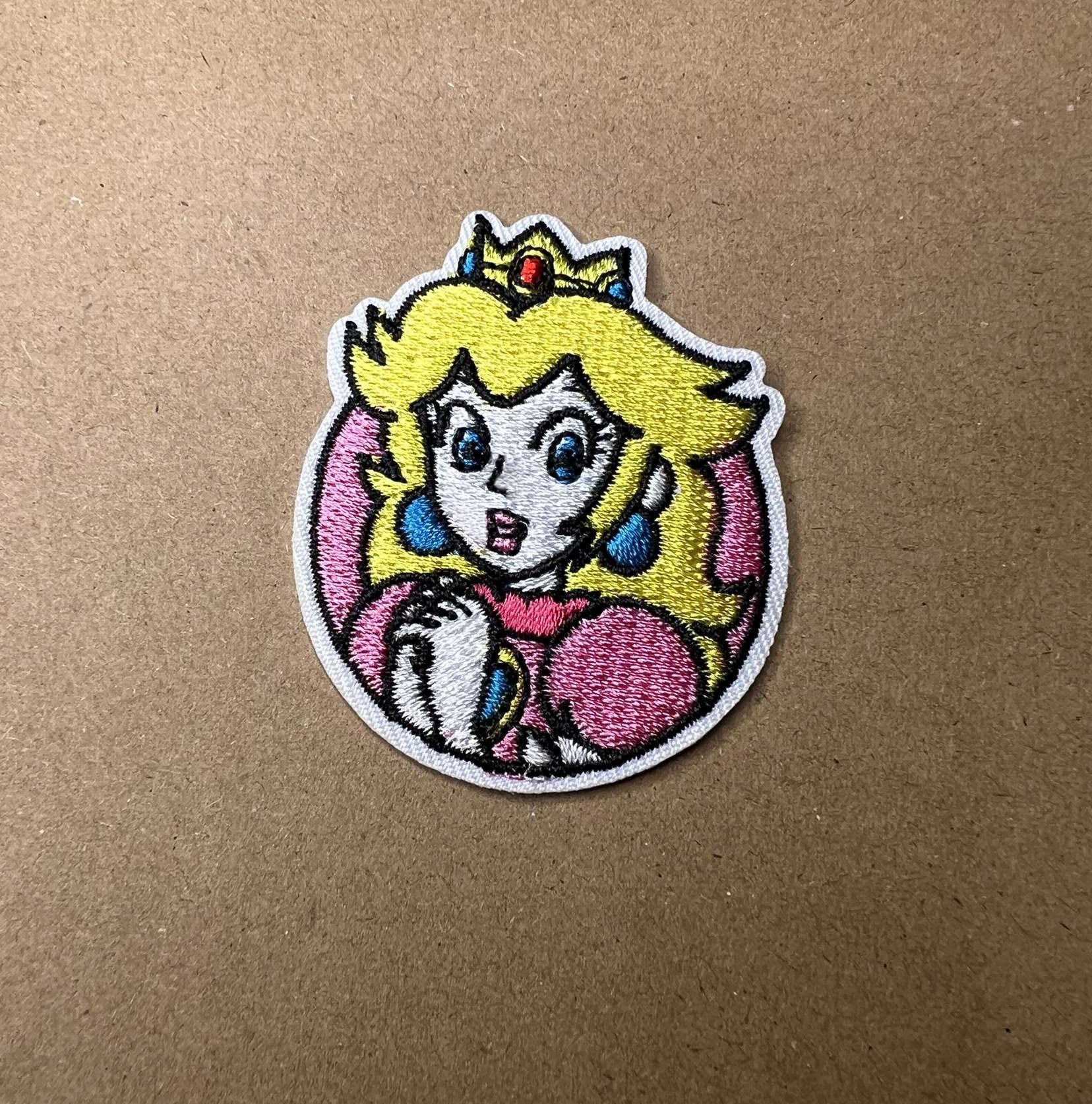 Brodert strykemerke av Prinsesse Peach