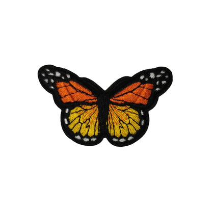 Brodert strykemerke, orange, gul og hvit sommerfugl