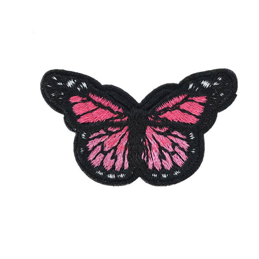 Brodert strykemerke, rosa og hvit sommerfugl
