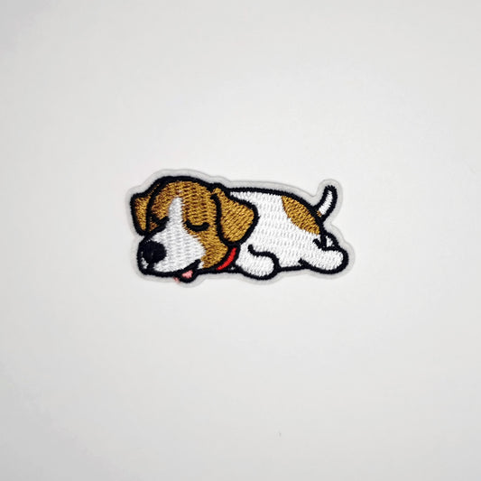 Brodert strykemerke med sovende hund