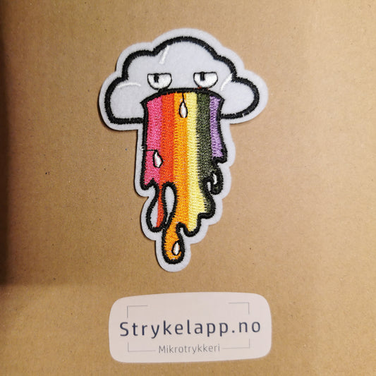 Brodert strykemerke av sky som spyr ut pride