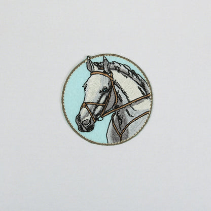 Brodert strykemerke med hestemotiv