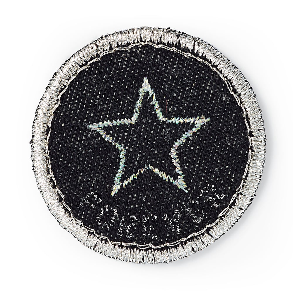 Brodert strykemerke av stjerne til jeans