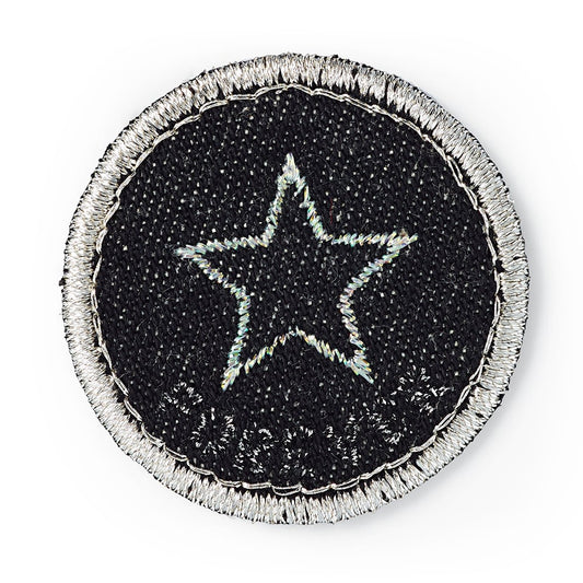 Brodert strykemerke av stjerne til jeans