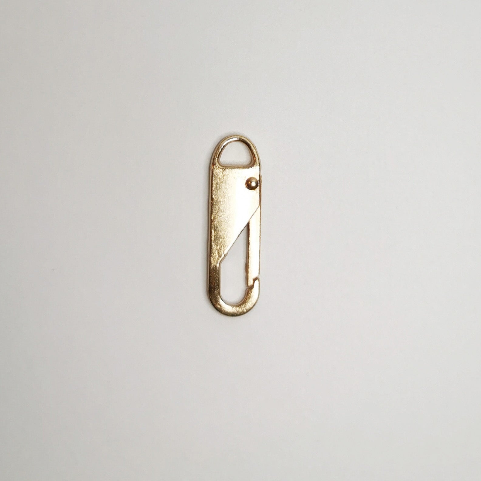 Universal glidelåshode gull