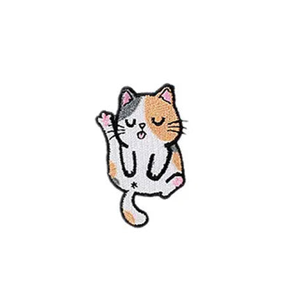 Brodert strykemerke av katt som vasker seg selv